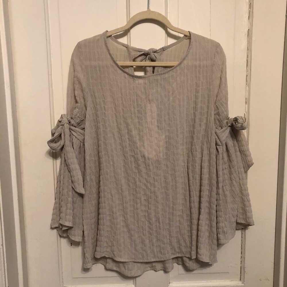 Cream long sleeve blouse with cute tie details
